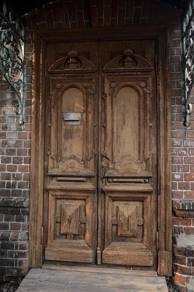 Integration of antique wooden doors into modern interiors